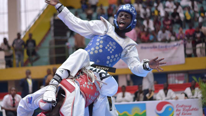Benon Kayitare, seen here in action, proving too good for his opponent, in a past taekwondo competition at Amahoro Indoor Stadium in Remera. File photo.