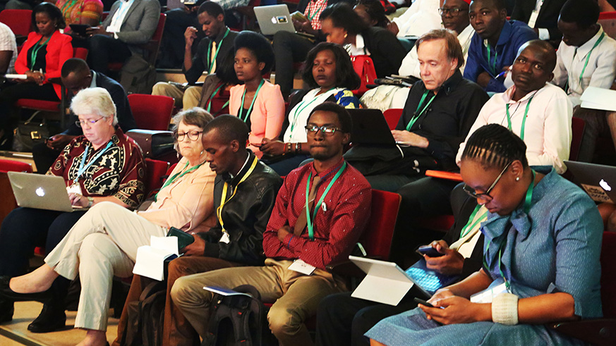 Participants follow a presentation during the African Innovation Summit in Kigali in June. Sam Ngendahimana.