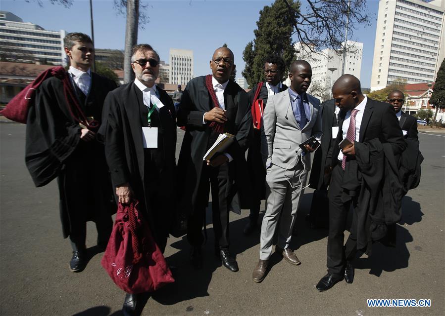 Lawyers representing MDC Alliance arrive at the Constitutional Court in Harare, Zimbabwe, Aug. 22, 2018. Zimbabwe's constitutional court on Wednesday morning began hearing an election petition challenging President Emmerson Mnangagwa's victory in the July 30 polls as the nation eagerly awaits outcome of the court challenge. (Xinhua/Shaun Jusa)