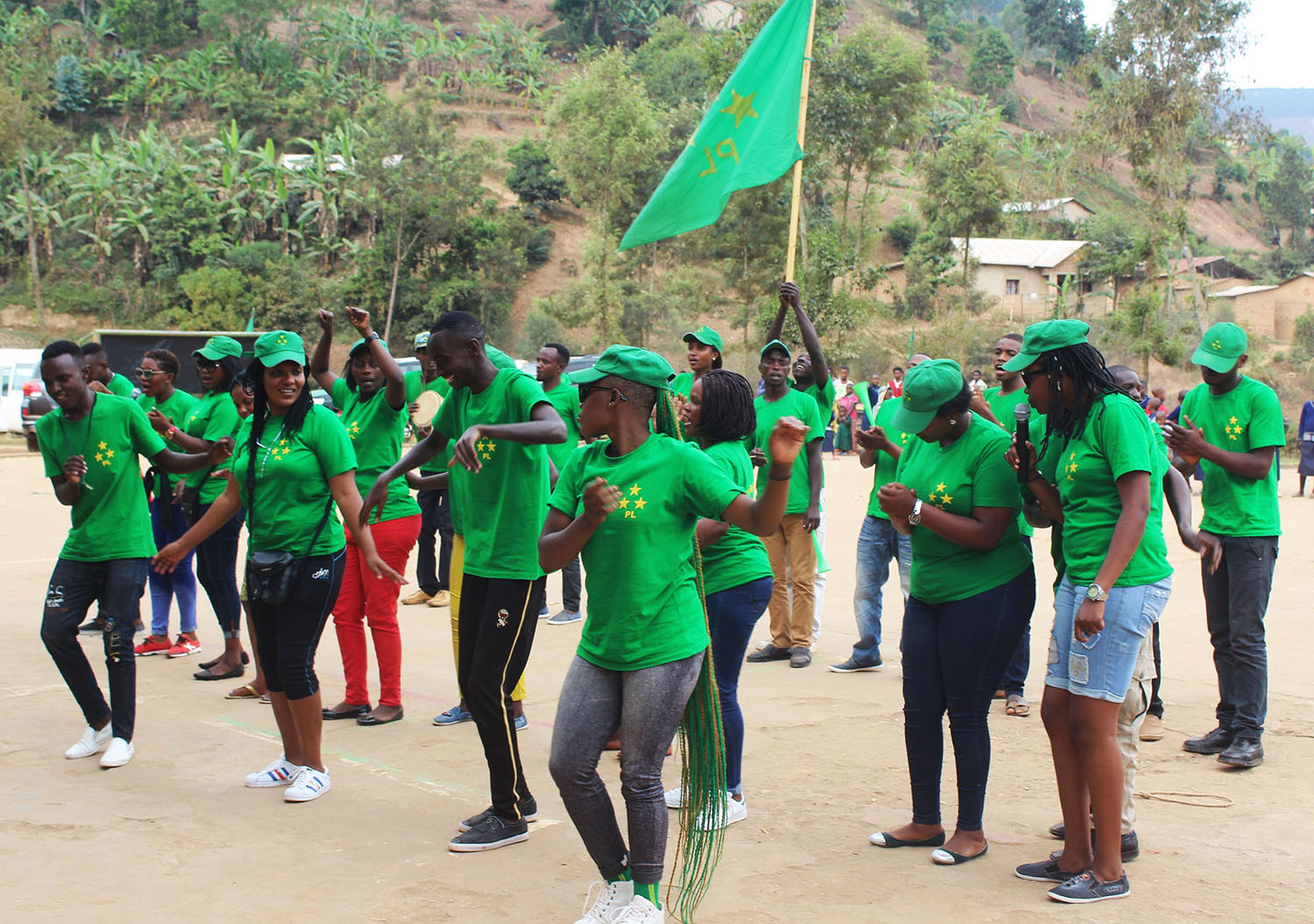 Liberal Party members dance at the rally held at Nemba Stadium, Burera District. Regis Umurengezi.