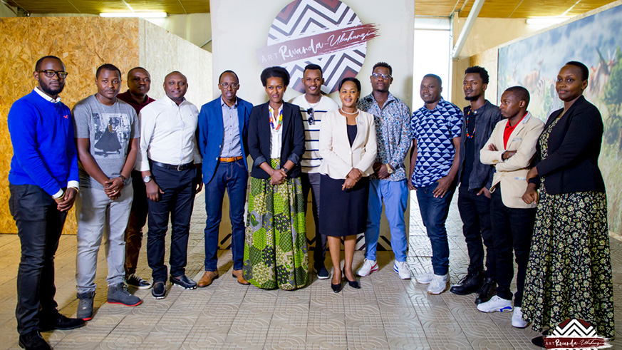 A cross-section of artistes pause for a group photo with the Minister for Youth Rosemary Mbabazi and the Director General of Imbuto Foundation Sandrine Umutoni during the launch of Art-Rwanda Ubuhanzi programme on Friday. Courtsey. 