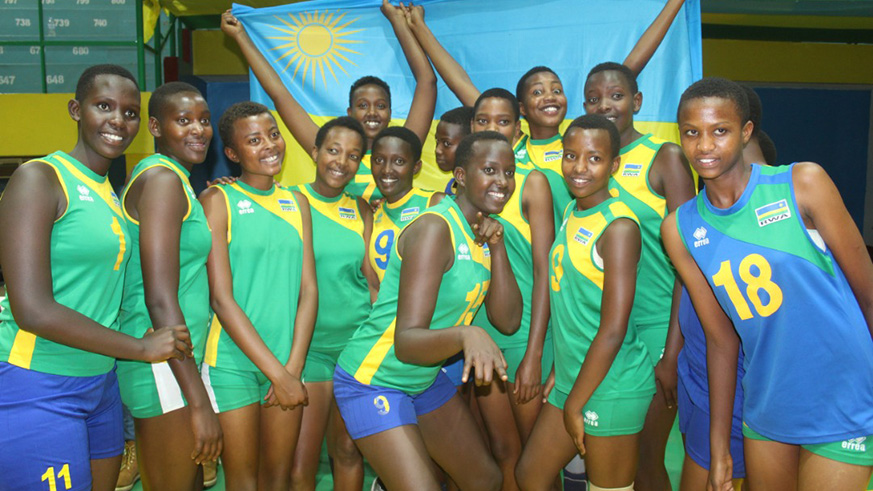 Players of the national U20 women's team show off with the Rwandan flag after their last training session at Amahoro Indoor Stadium on Wednesday. Damas Sikubwabo