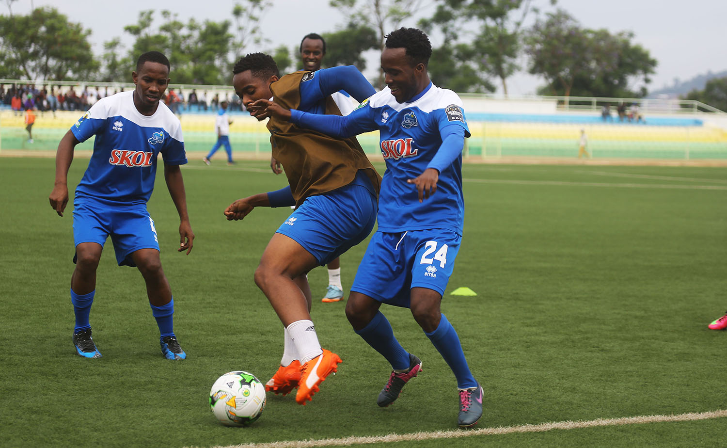 Rayon Sports midfielder Mugisha (c) and Nova Bayama vie for the ball during the training session yesterday. Sam Ngendahimana.