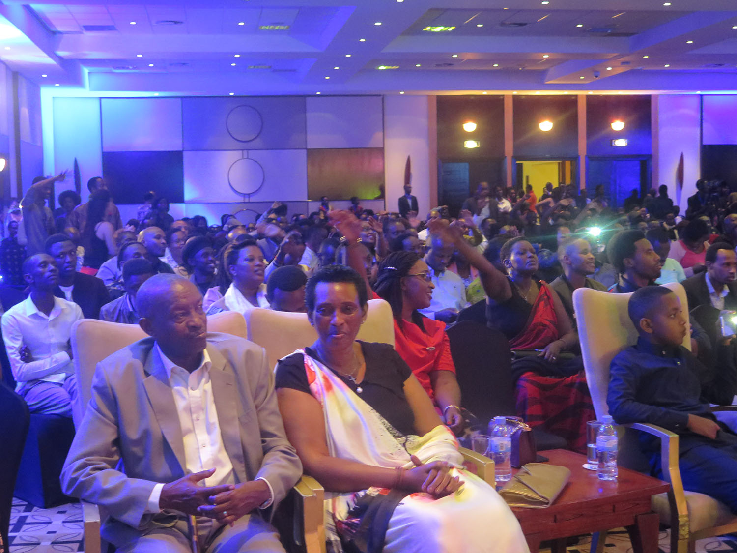 Umulizaâ€™s parents (front row) attended the concert.   Andy Bumuntu on stage. 