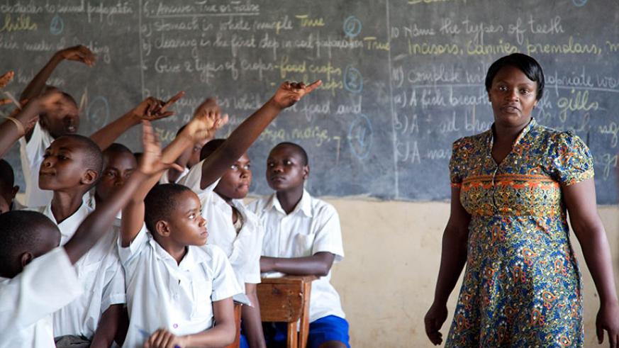 A teacher conducts lessons at Kimisagara Primary School in Kigali.