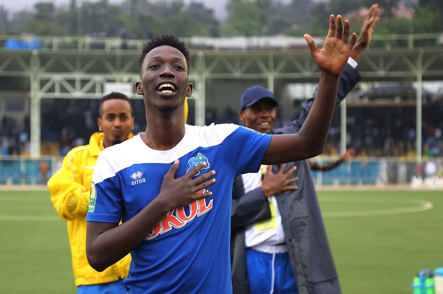 Goal scorer Caleb Bimenyimana sings the team's hymn after qualifying his side to quater finals (Sam Ngendahimana)
