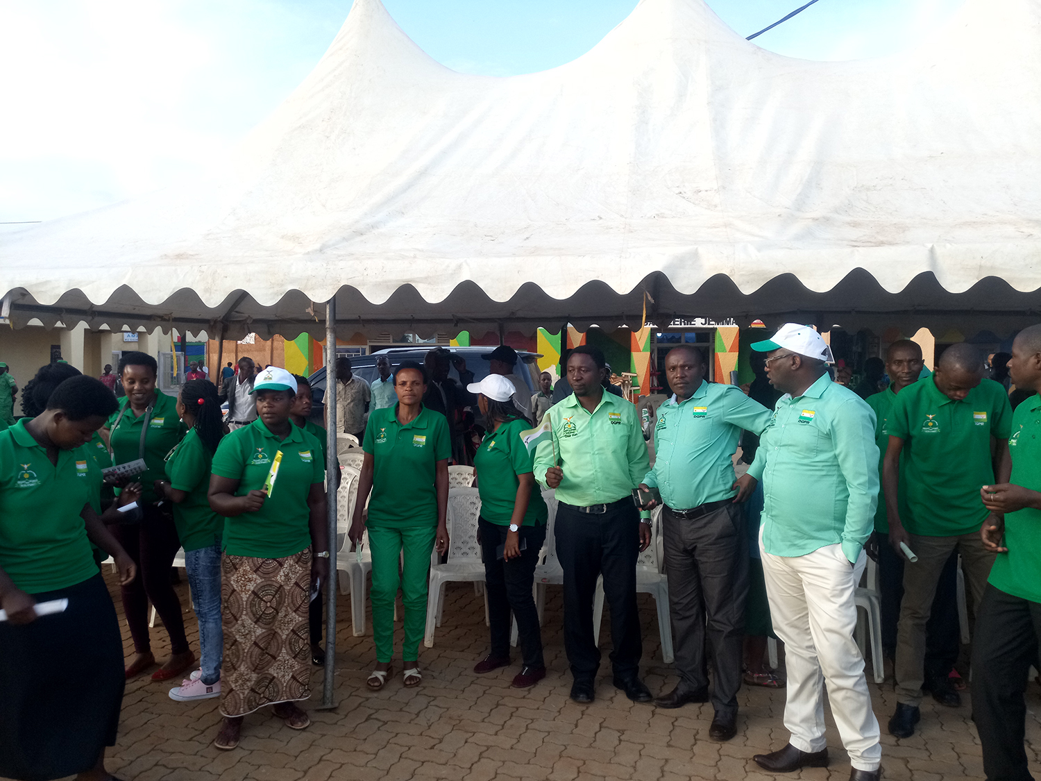 Green Partyu2019s Frank Habineza dances with party members in Gahanga, Kicukiro District on Monday. Jean du2019Amour Mbonyinshuti. 