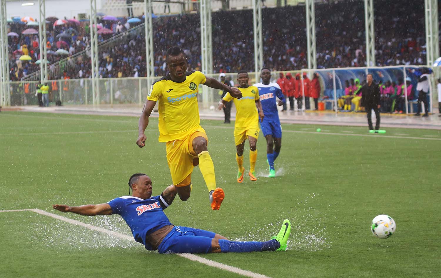 Skipper Abdoul Rwatubyaye captured in action against Tanzanian striker during the match