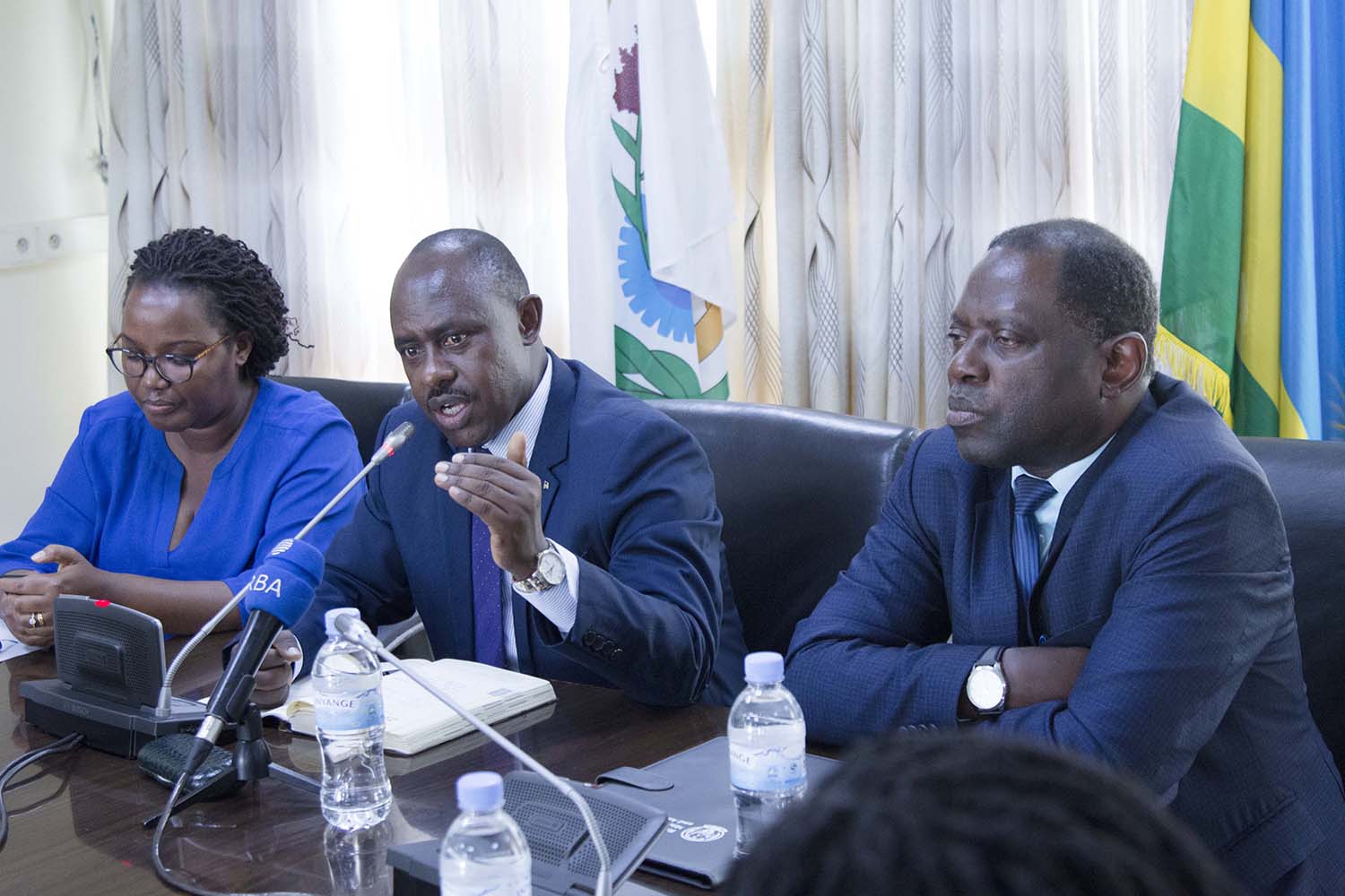 Education minister Eugene Mutimura (centre) makes a point as Minister for Agriculture, Gu00e9rardine Mukeshimana (left) and State Minister in charge agriculture, Fulgence Nsengiyumva, look on during the signing of the partnership in Kigali yesterday. Emmanuel Kwizera.