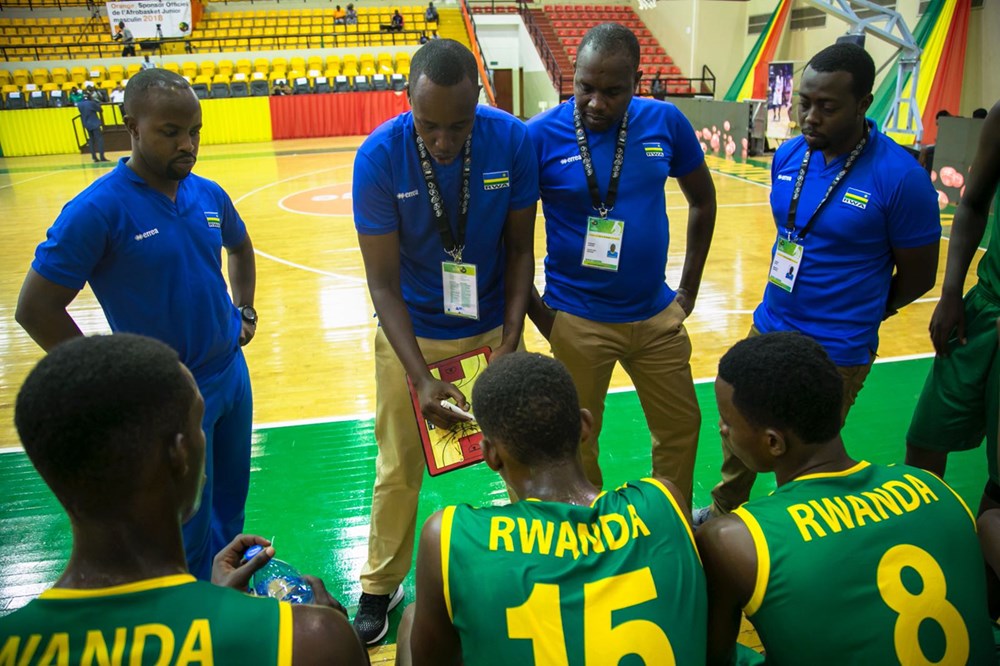 Rwandau2019s U18 basketball team head coach Yves Murenzi gives instructions to his players during the 62-58 victory over Tunisia last Saturday at Palais de Sports Salamatou Maiga in Bamako Mali. Courtesy.