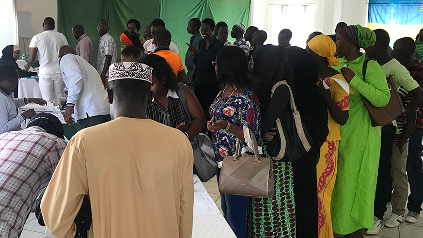 Voters at a polling station line up in Mombasa to cast their votes yesterday . Courtesy.