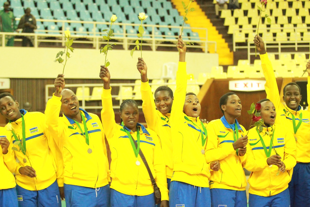 The national team players and staff show off their silver medals after finishing second in this yearu2019s African Championship at Kasarani Indoor Stadium in Nairobi, Kenya on Sunday. Courtesy.