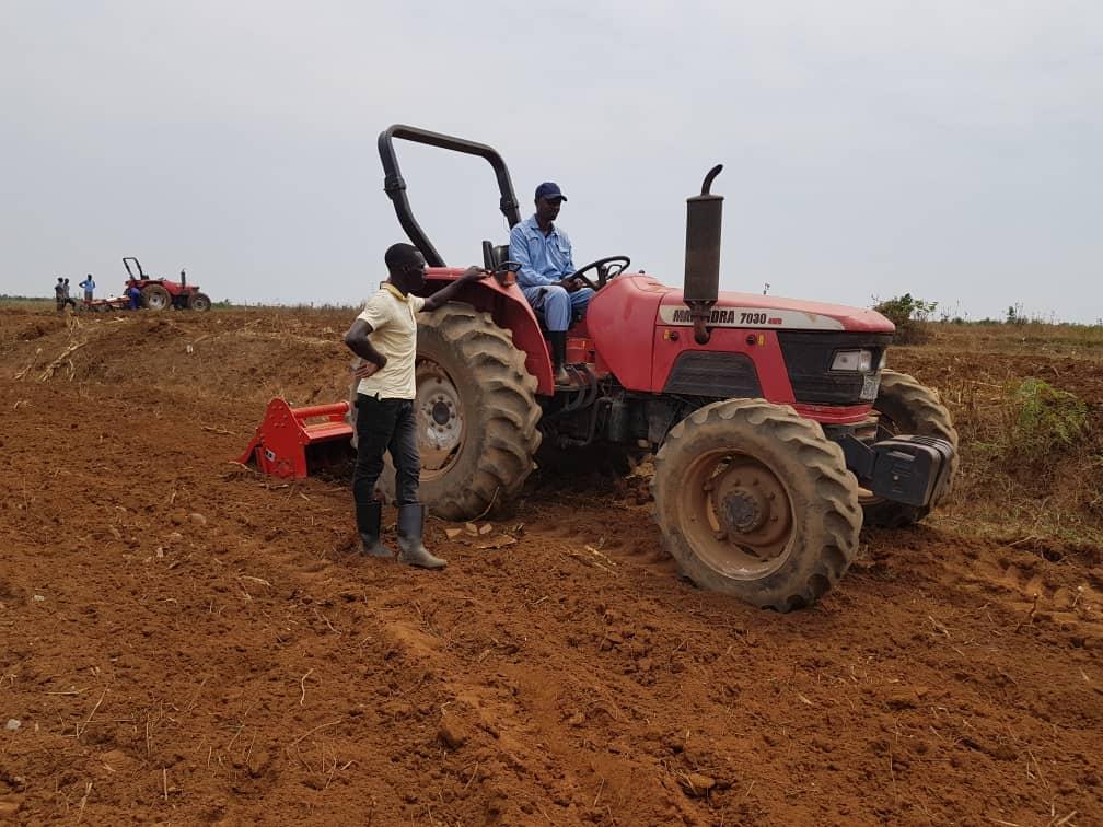 Theophile Uzayisenga uses mechanization to double harvest by exploiting idle land. Michel Nkurunziza