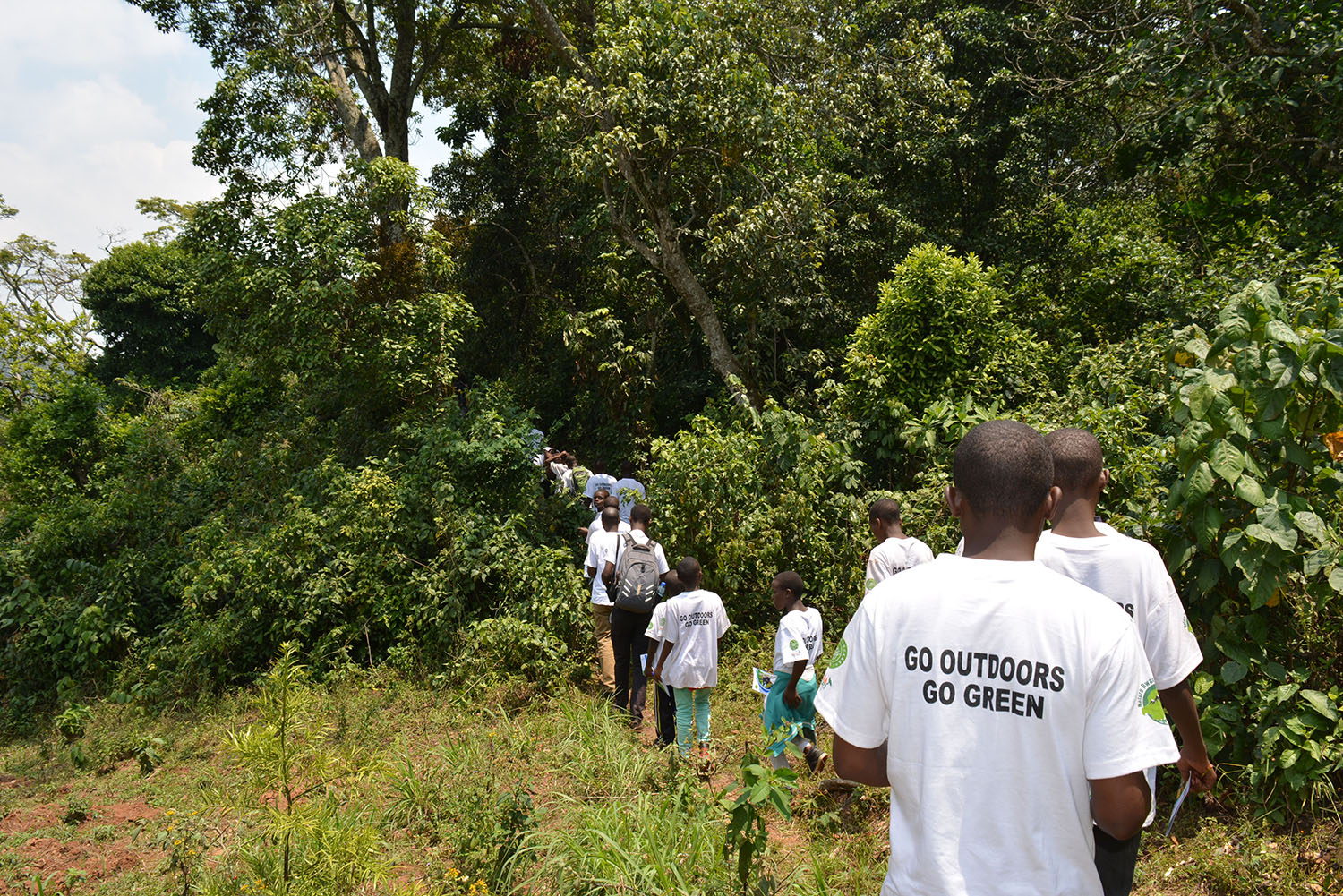 A group of student entering Busaga Forest for a study tour.