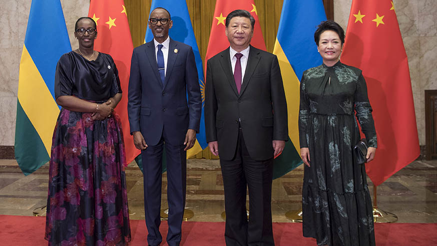 President Paul Kagame and First Lady Jeannette Kagame pose with Chinese President Xi Jinping and First Lady Peng Liyuan after a bilateral dinner in Beijing yesterday. Kagame has backed the Africa-China development framework announced on Monday by President Xi. Village Urugwiro.