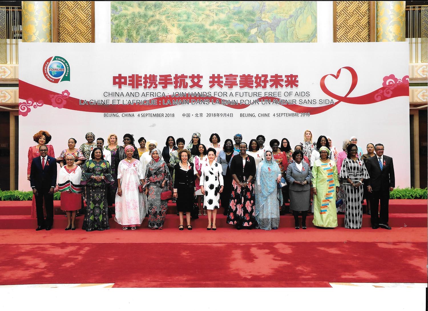First Lady Jeannette Kagame (6th right), Chinese First Lady Peng Liyuan (centre); UNAIDS chief Michel Sidibu00e9 (left) and WHO Director General, Dr Tedros Adhanom Ghebreyesus (right), in a group photo with other African First Ladies in Beijing yesterday. Courtesy.
