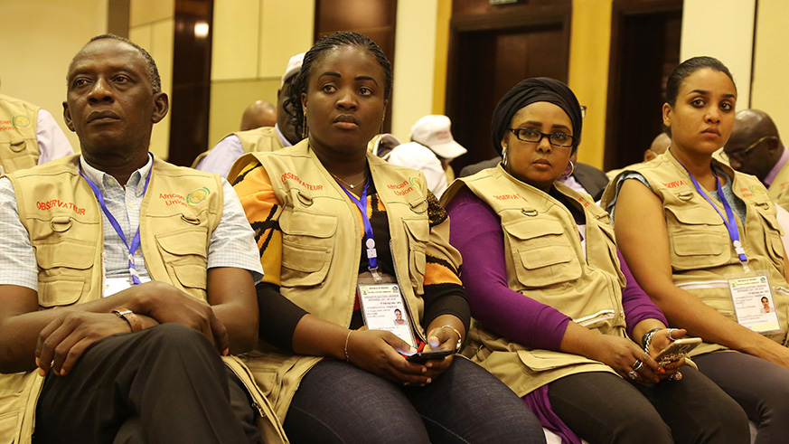 African Union election observers follow the presentation of the report on the just-concluded parliamentary elections in Kigali yesterday. Photos by Sam Ngendahimana.