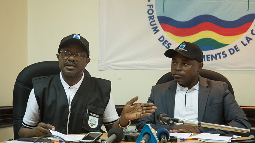FP-ICGLR secretary-general Amb Onyango Kakoba speaks as head of  the obsever mission David Yama looks on at the news conference in Kigali yesterday. Nadu00e8ge Imbabazi
