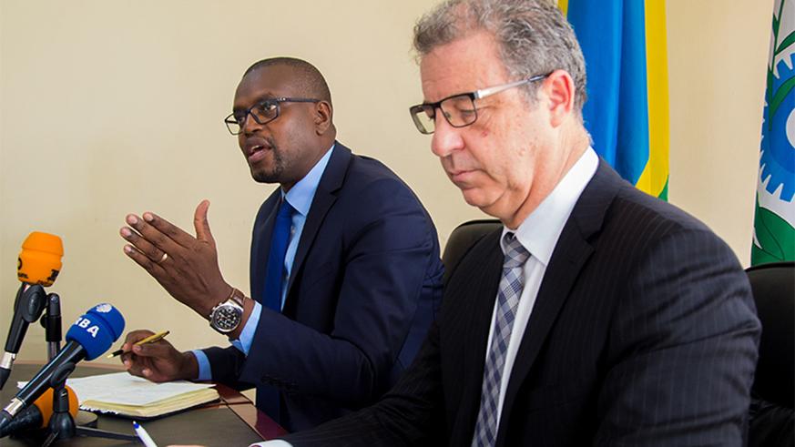 Prosecutor General Mutangana together with MICT Prosecutor, Dr Serge Brammetz, brief the media in Kigali during a past event. File.