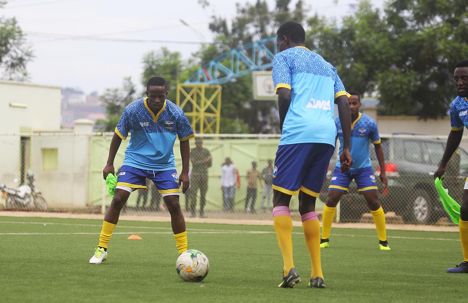 Niyonzima (left) and his teammates during a training session at Kigali Stadium. Sam Ngendahimana.