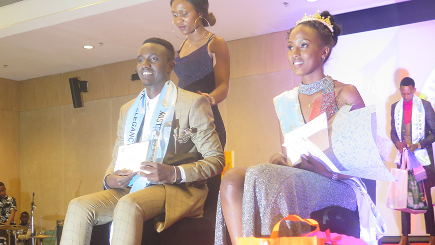 Divic Nshongore Niyirora (left)  and Rosine Mukangwije after being crowned Mister and Miss Elegance Rwanda 2018. Eddie Nsabimana
