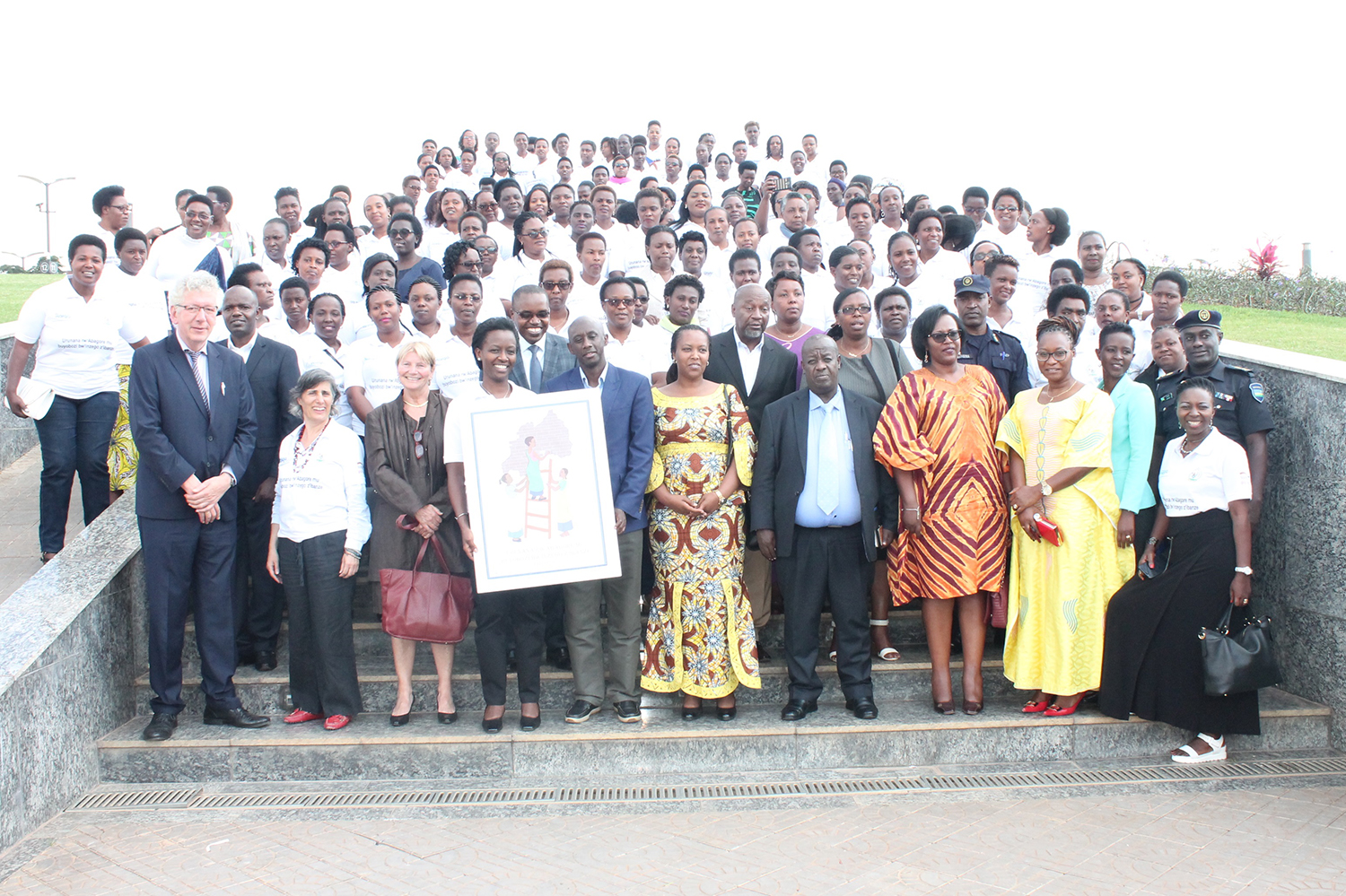Officials pose for a group photo with the founding members of the new women network. Courtesy.