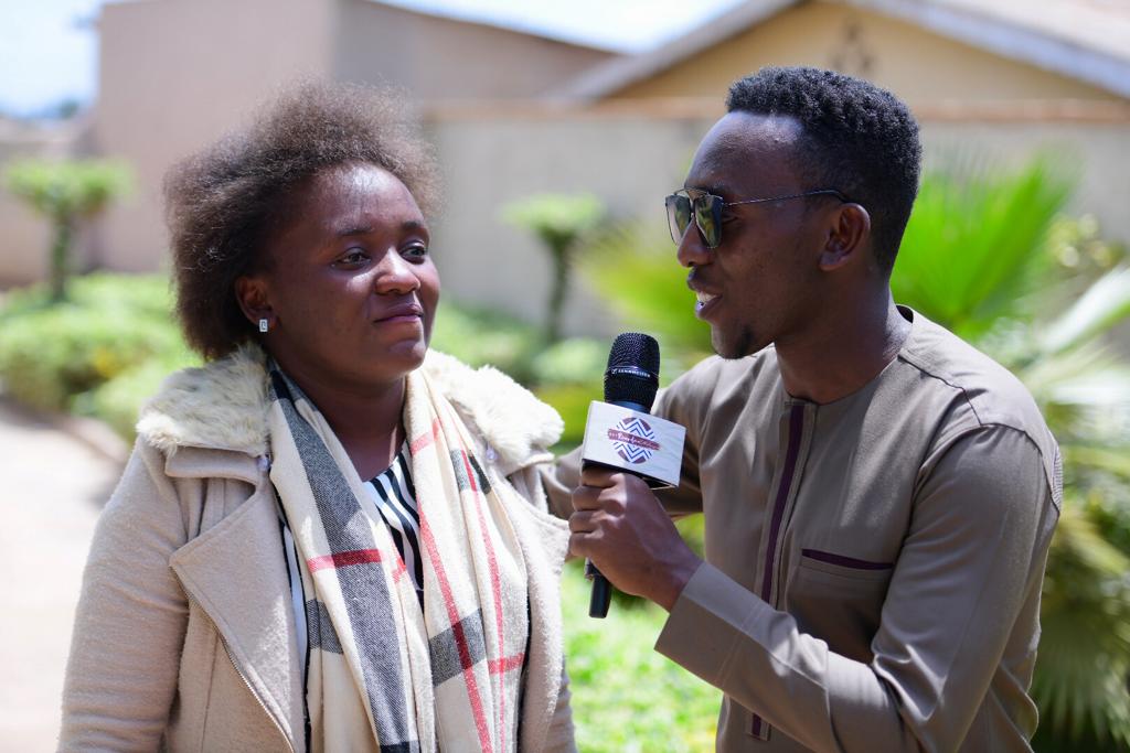The host Arthur Nkusi (L) interviews Ishimwe who got a pass.