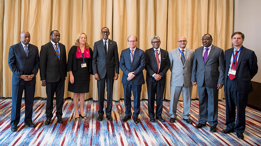 President Kagame and other officials pose for a group photo at the World Bank Development Finance Forum in Kigali yesterday. Village Urugwiro.