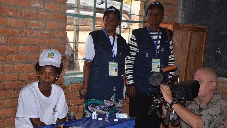 COMESA observers monitor last yearâ€™s presidential elections at GS Kimironko II polling station in Kigali.