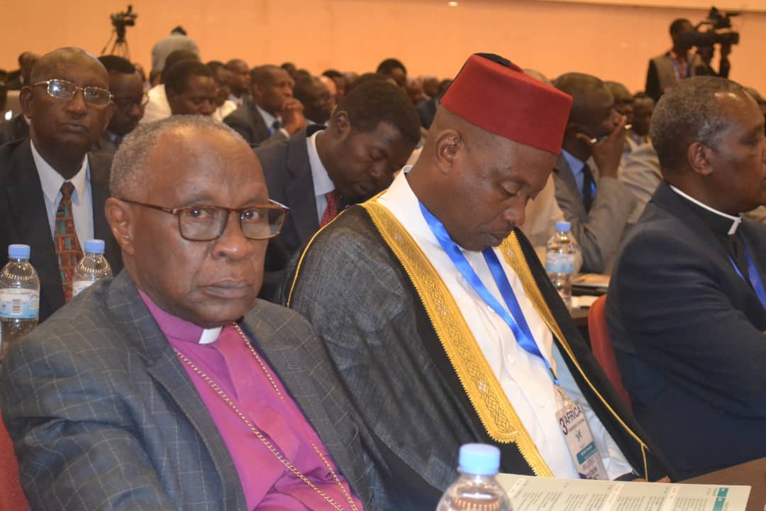 Bishop John Rucyahana, the President of the National Unity and Reconciliation Commission, and Sheikh Salim Hitimana, the Mufti of Rwanda, during the conference at Kigali Convention Centre. / Kelly Rwamapera