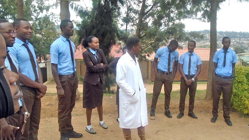 A teacher talking to students. Discussing with students about their hobbies can help them discover their talents. Lydia Atieno.