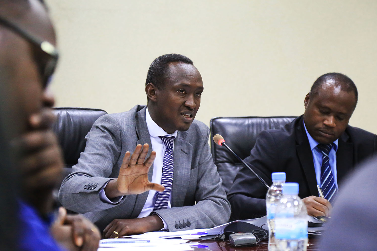 Ivan Murenzi, Deputy Director General of the National Institute of Statistics of Rwanda (left), gestures during a news briefing as Minister for Finance and Economic Planning, Uzziel Ndagijimana, takes notes in Kigali yesterday. Sam Ngendahimana.