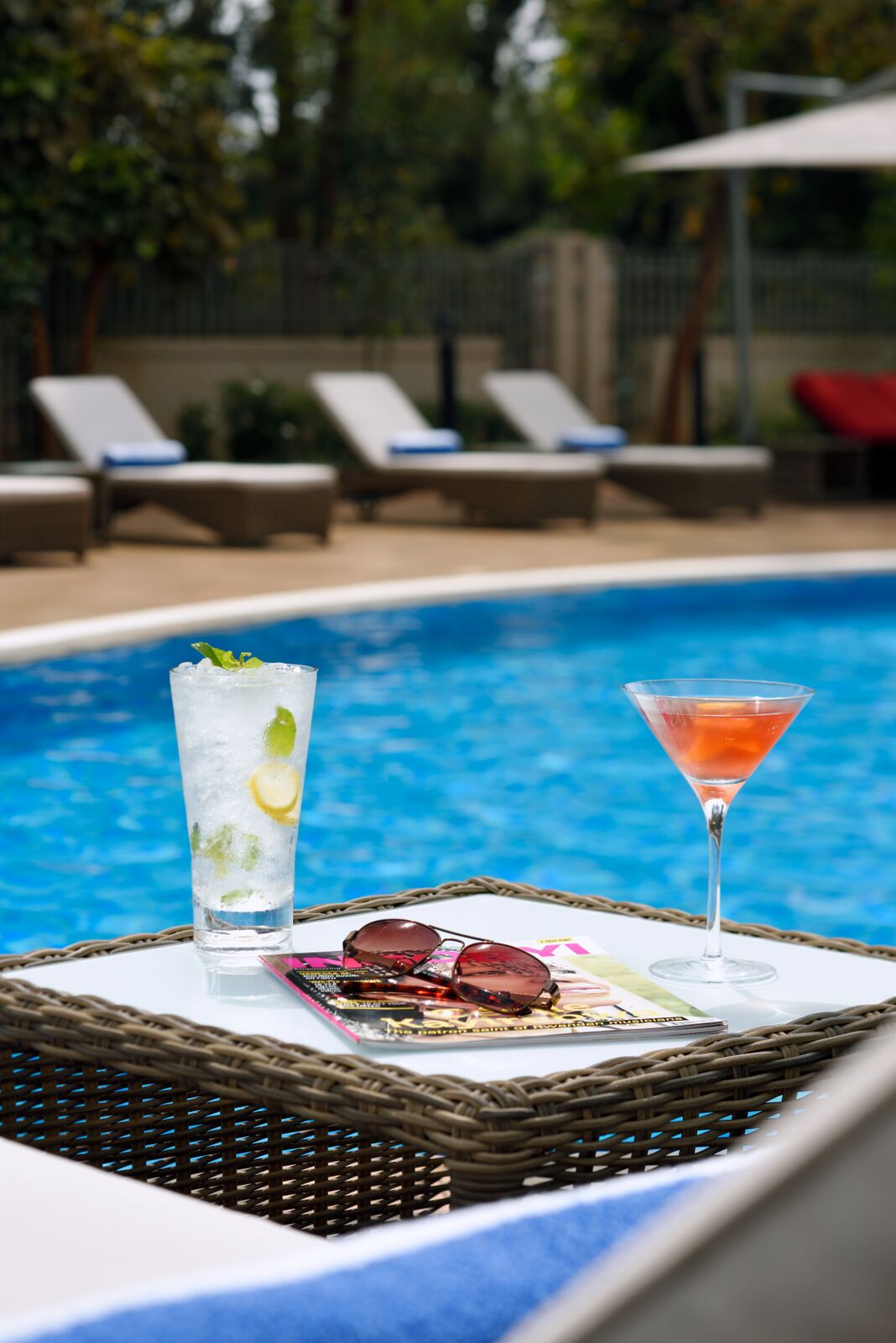 A drink by the pool. A drink by the pool.