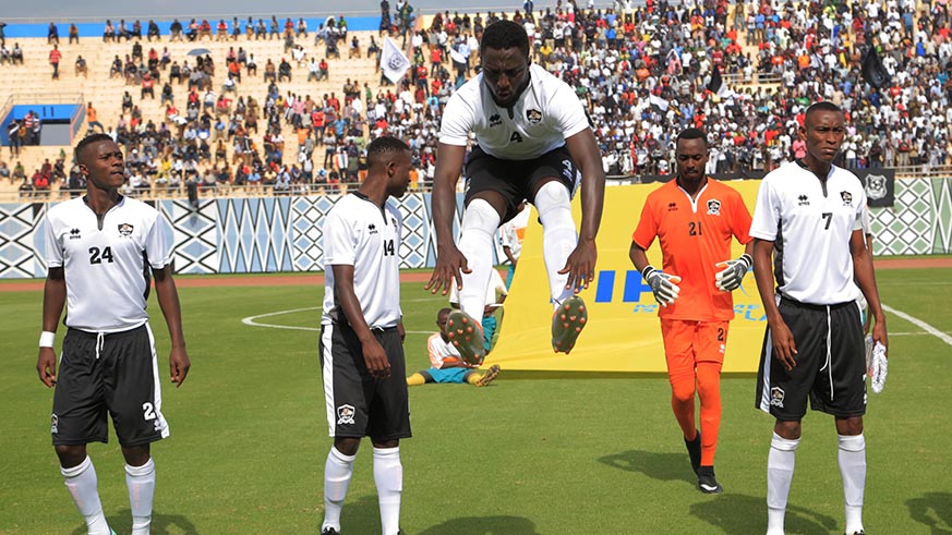 Army side defender Herve Rugwiro in the air before starting the game (Sam Ngendahimana)