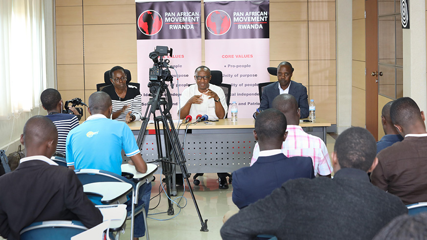 Protais Musoni (center), chairperson for the Pan African Movement Rwanda. (Photo by Emmanuel Kwizera)