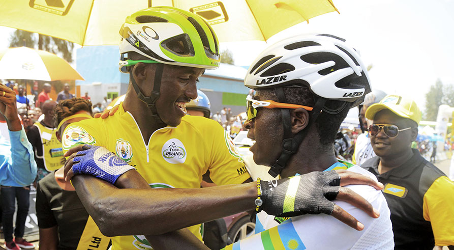 Tour du Rwanda 2018 winner Samuel Mugisha (left) thanks his compatriot Didier Munyaneza for supporting him during the race. They will both ride in World Road Race Championships in Austria. Sam Ngendahimana.