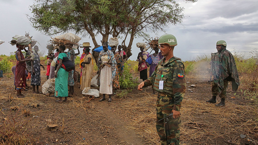 Ethiopian peacekeepers deployed to the United Nations Mission in South Sudan (UNMISS) escort a group of women outside a UN-run site and create a safe perimeter within which they can search for firewood without being at risk of attack, 28 March 2017. Net photo.