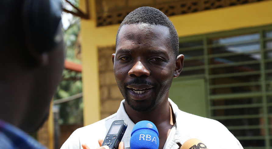 Mpayimana speaks to journalists after casting his vote during the legislative elections ealier this month. Sam Ngendahimana.