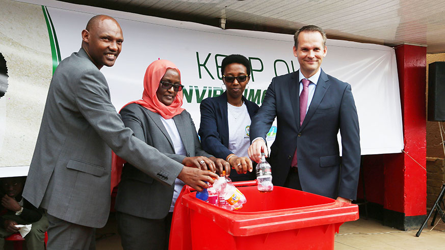Colette Ruhamya, Director General of the Rwanda Environment Management Authority (2nd right), during the launch of a campaign to fight the use of plastic bottles recently. File.