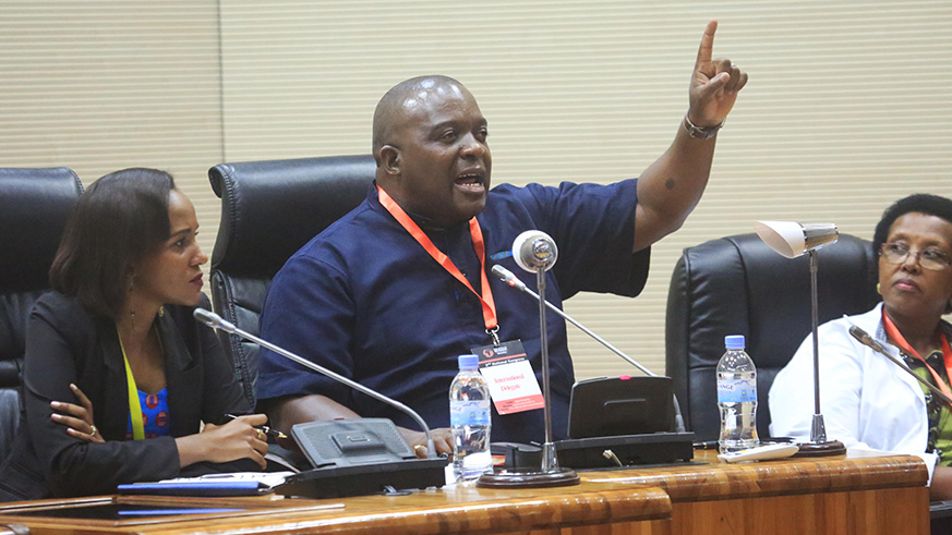 Brian Kagoro , Member of Governing Council Grobal Panafrican Movement addresses the second National Congress (Sam Ngendahimna)