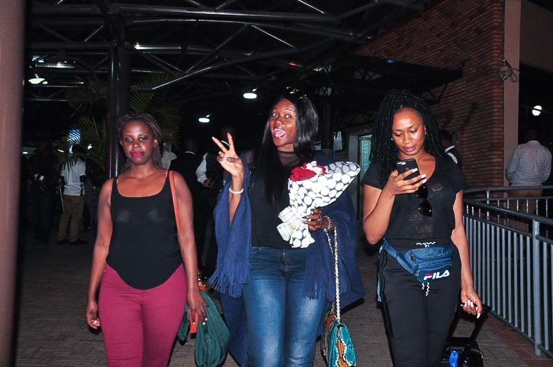 The 'Kponlongo' star, Waje (second left) was welcomed at Kigali International Airport by RG Consult, organisers of the Kigali Jazz Junction. Courtesy photos.