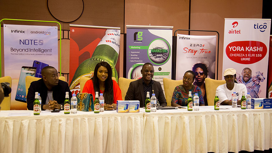 Nigerian singer Waje (centre) speaks to journalists during the news conference, which was held on Wednesday at Kigali Serena Hotel.