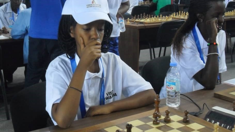 Layola Murara Umuhoza, 15, contemplating her next move during her round two game on Tuesday. Courtesy