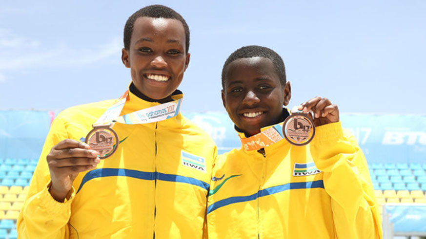 Valentine Munezero (left) and Penelope Musabyimana pose after winning bronze medals at the 2017 Youth Commonwealth Games in Nassau, Bahamas. File photo.