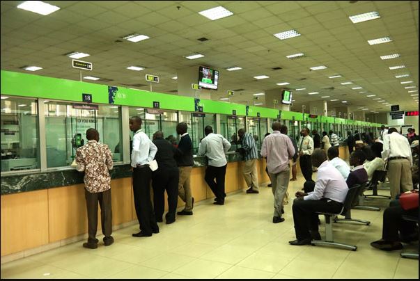 KCB is one of the banks that have been lauded for their flexible cross boarder operations. Here, customers are being served at one of the KCB Rwanda branches.  File.