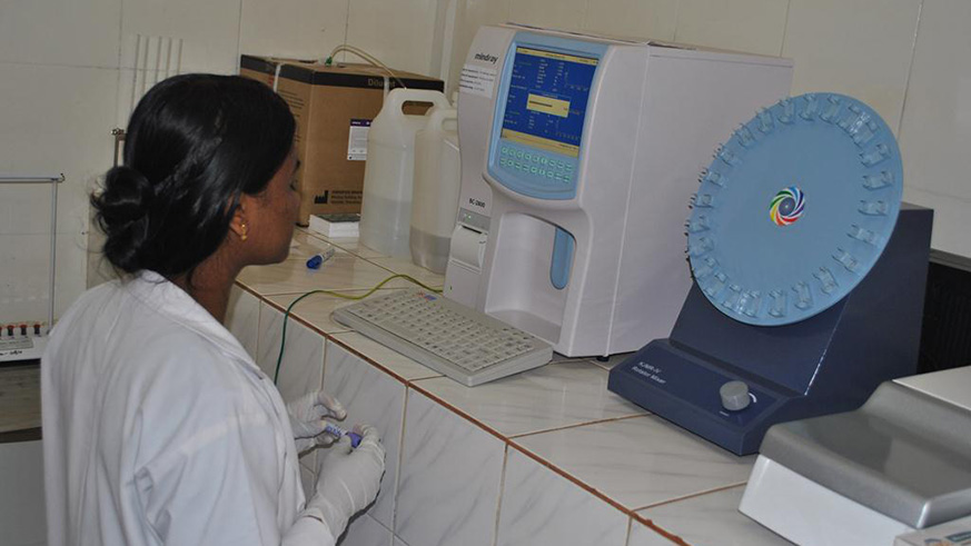 A medic in the labarotory. Testing for HIV drug resistance is important. /Courtesy