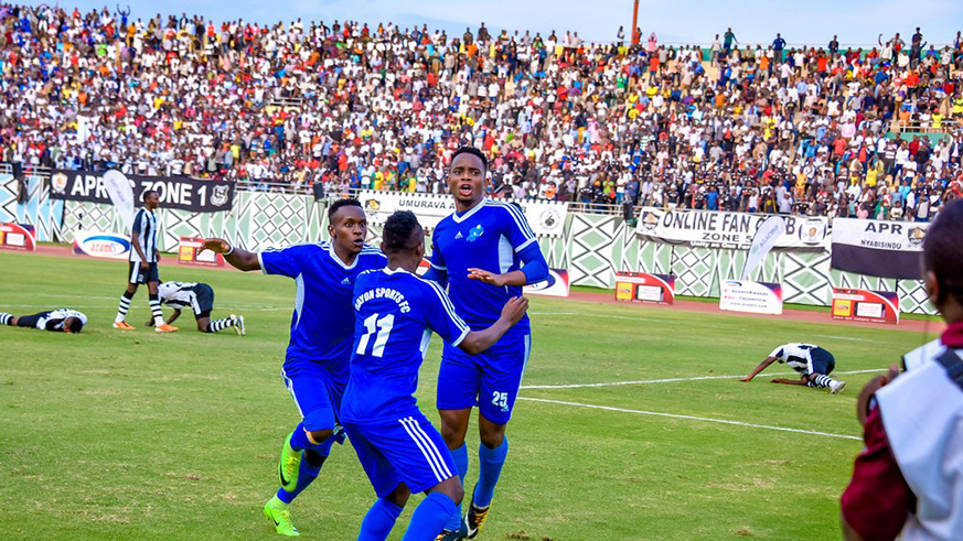 Francois u2018Masteru2019 Mugisha (#25) celebrates with teammates after scoring in stoppage time to inspire Rayon Sports to a second Agaciro Cup title in a row at the expense of APR at Amahoro Stadium on Sunday. Courtesy.