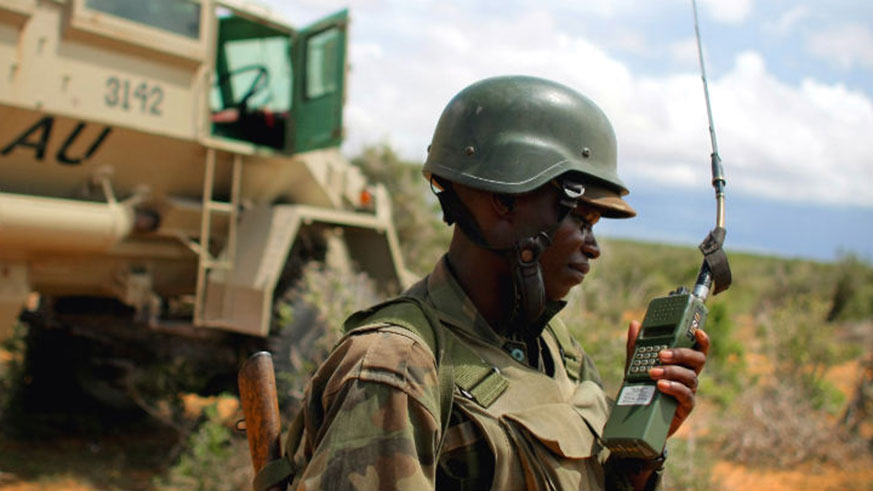 An AMISOM field commander in front of an armoured personnel carrier. / Internet photo