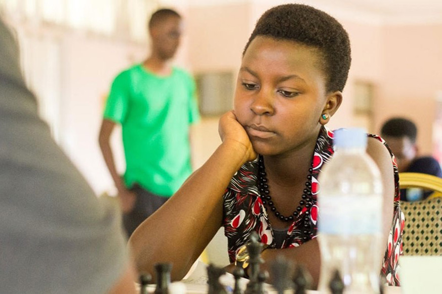 Joselyne Uwase, 15, is Rwandau2019s first and only female chess player to reach the feat. She is seen here in action during a past local tournament in Kigali. File photo.