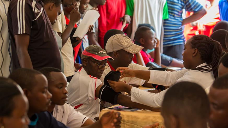 Volunteers take free medical check-ups during a medical camp at Rwanda Revenue Authority offices in Kimihurura, Kigali. (File)